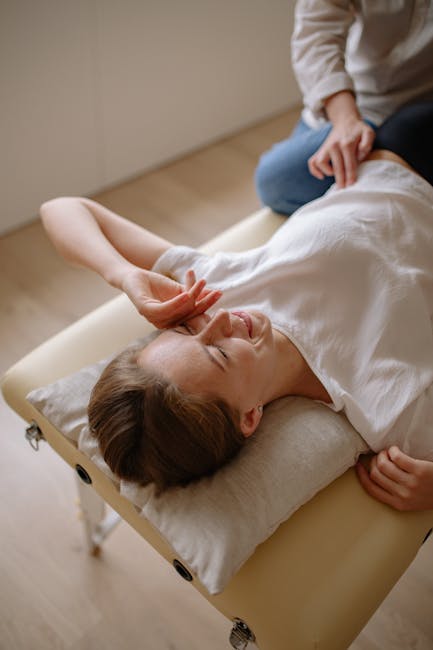 hands performing gentle circular massage movements around closed eyes demonstration